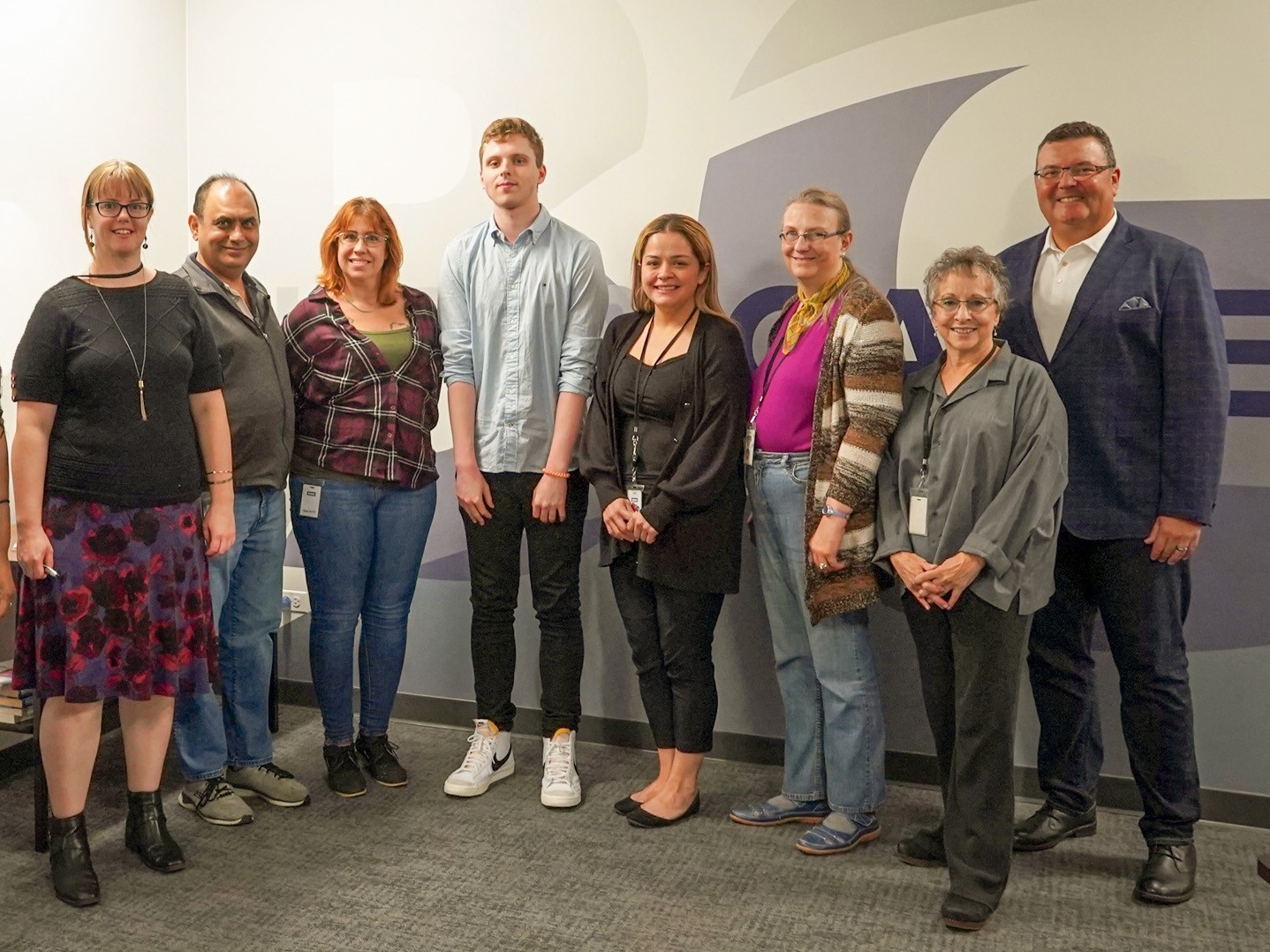 A photo of Blitt and Gaines team with Employment member Nick smiling.