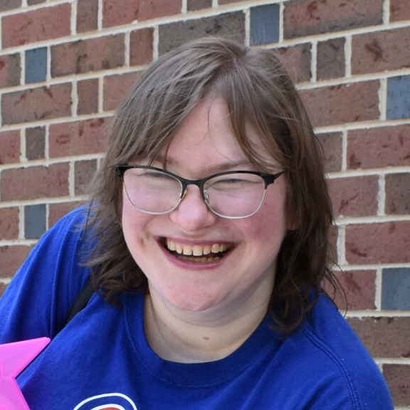 A picture of CEL member Jenny smiling during community day.