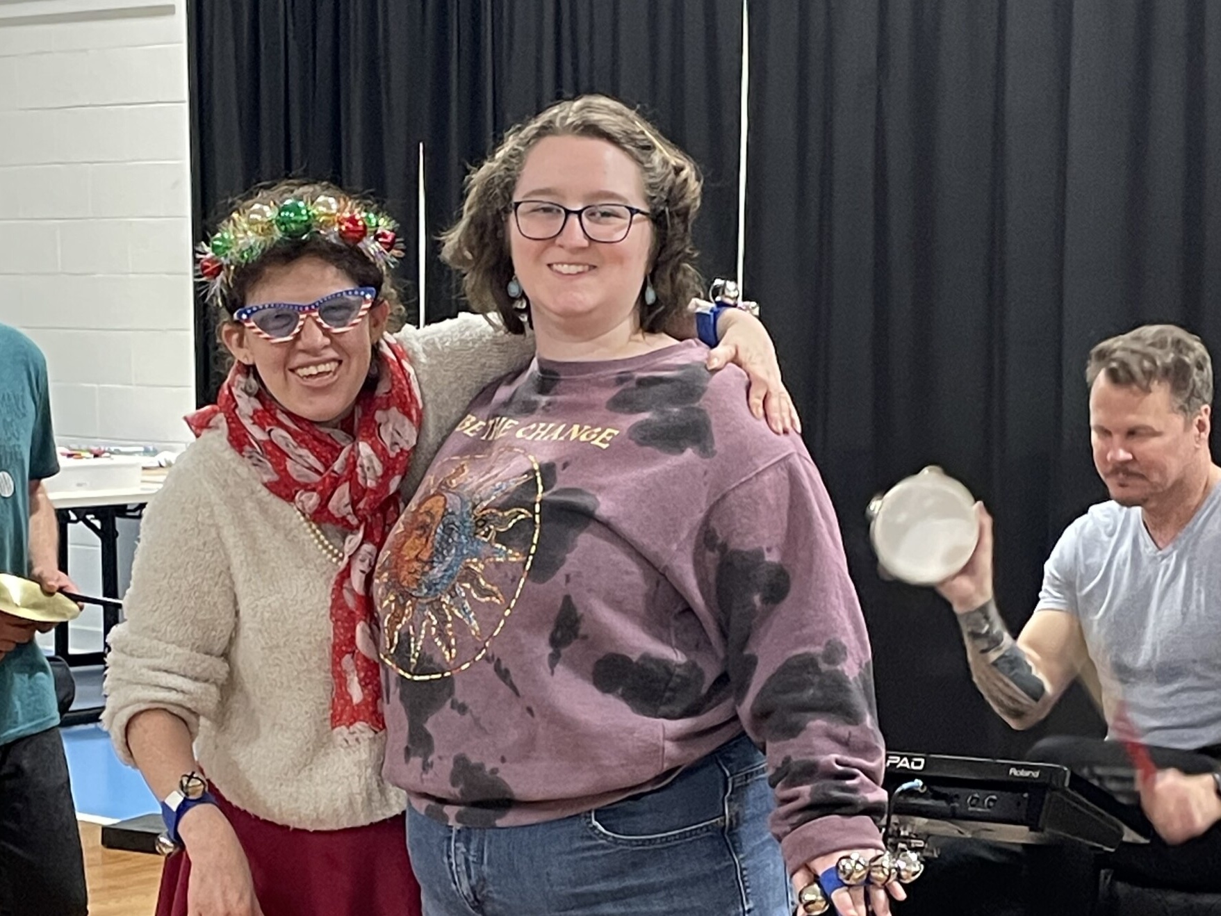 Two CEL members Ally and Sarah smiling during a Friday Night Music activity.