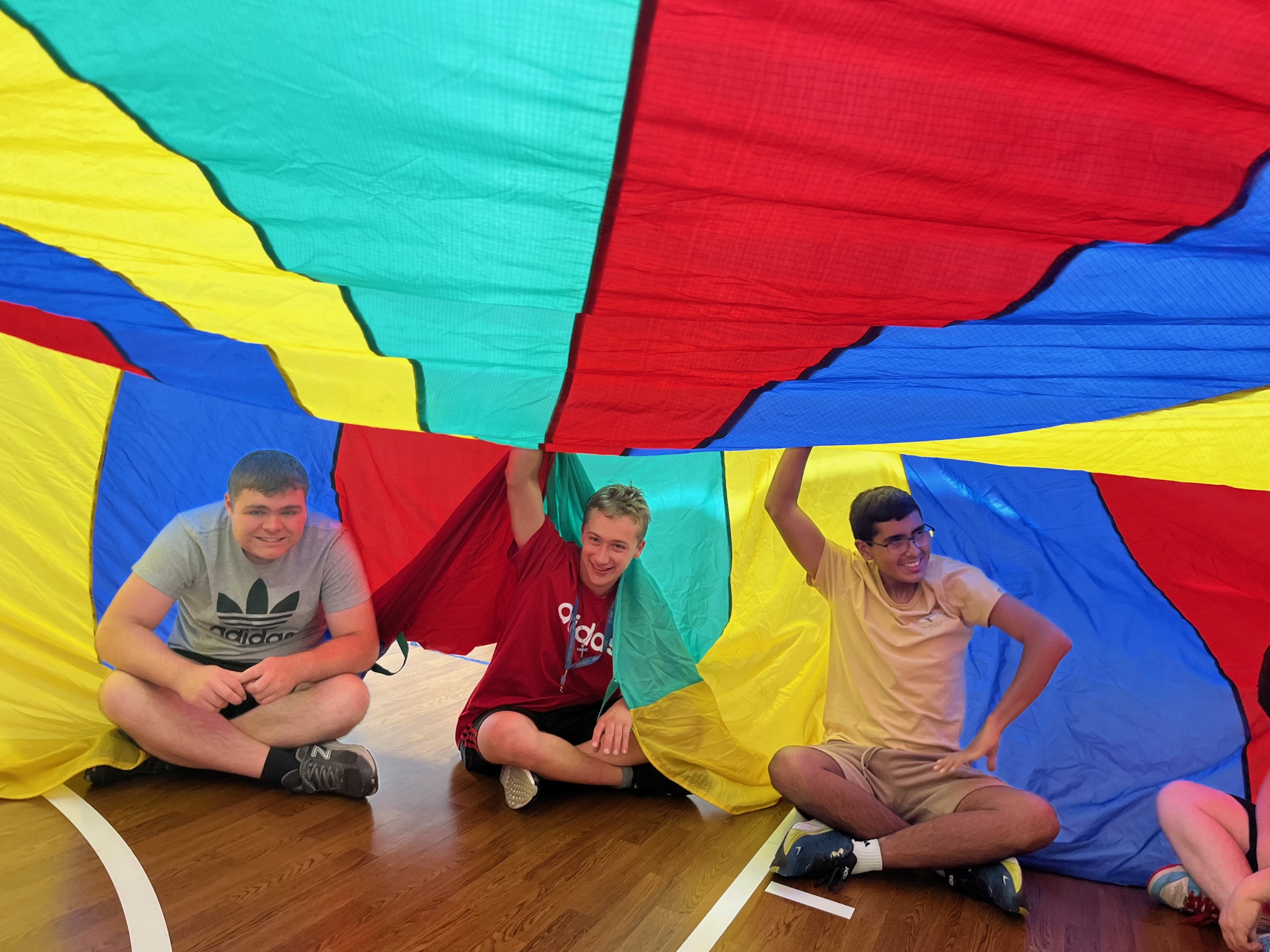 A photo of CEL summer camp members smiling during activity.