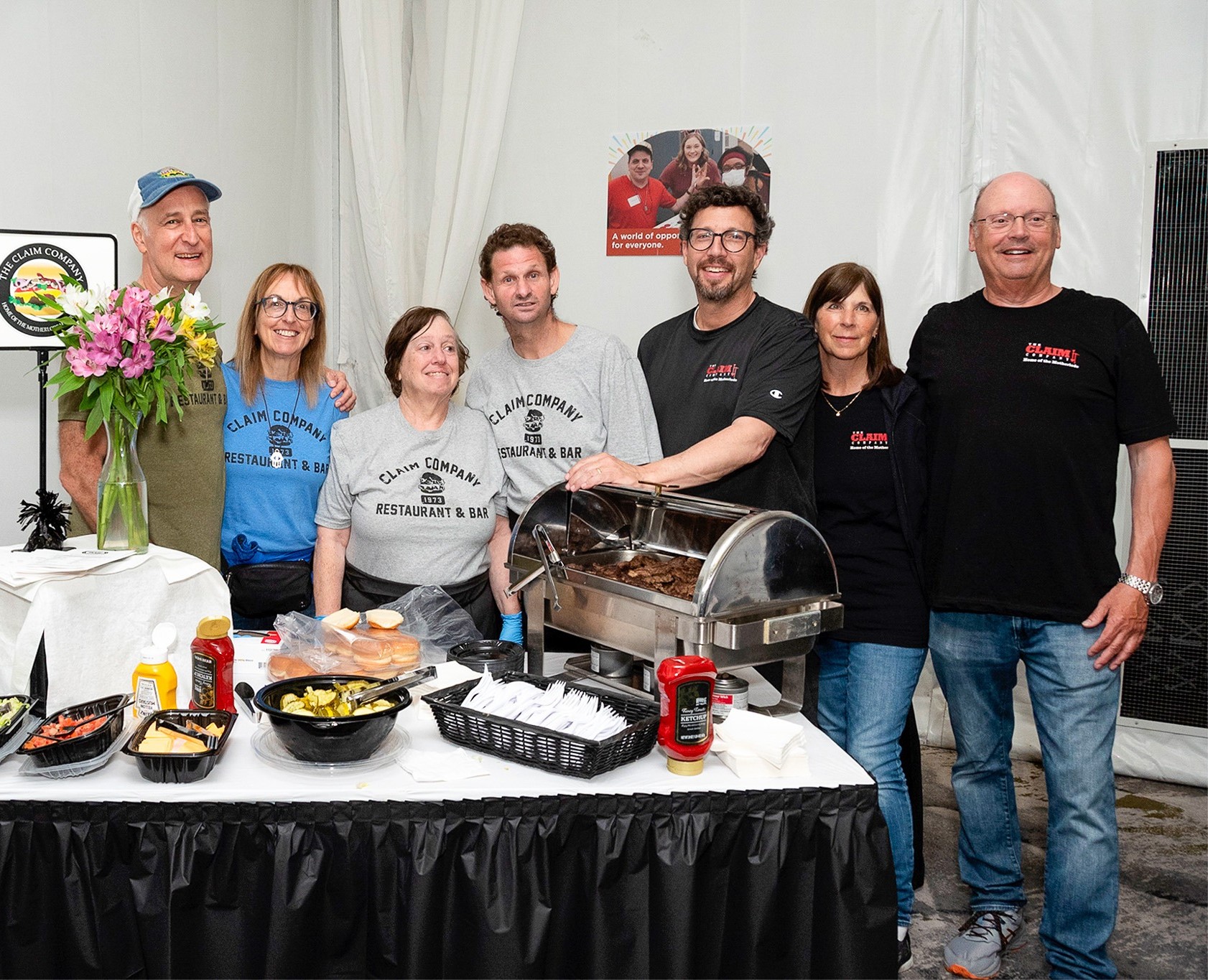 A group of Chefs' Tasting Partners posing with CEL members.