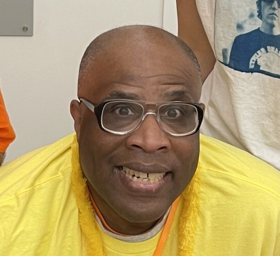 A picture of a male CEL member smiling.