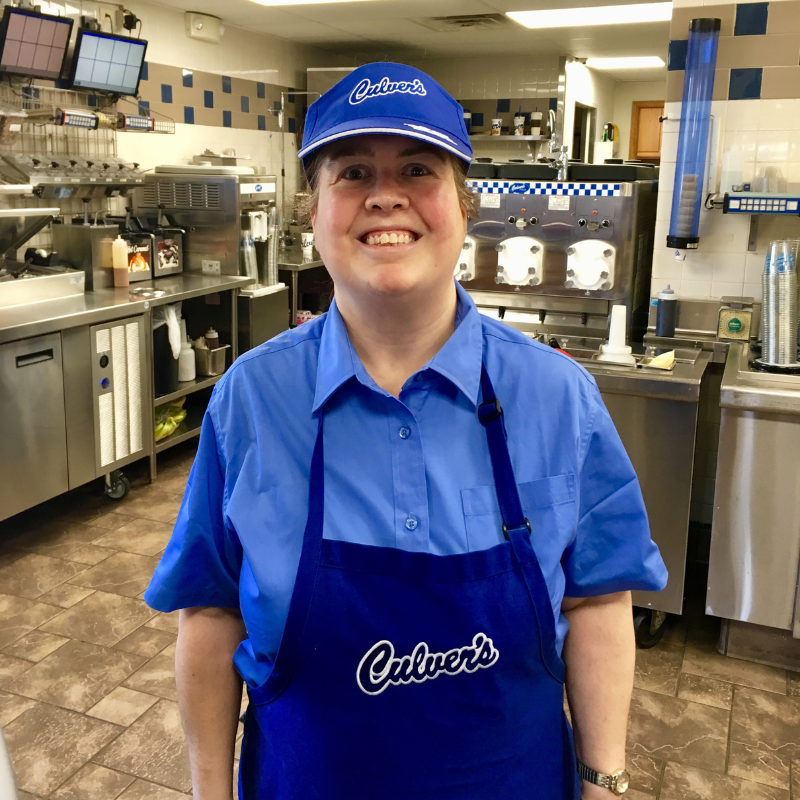 A photo of CEL Employment member Patricia smiling proudly in her uniform at Culver's