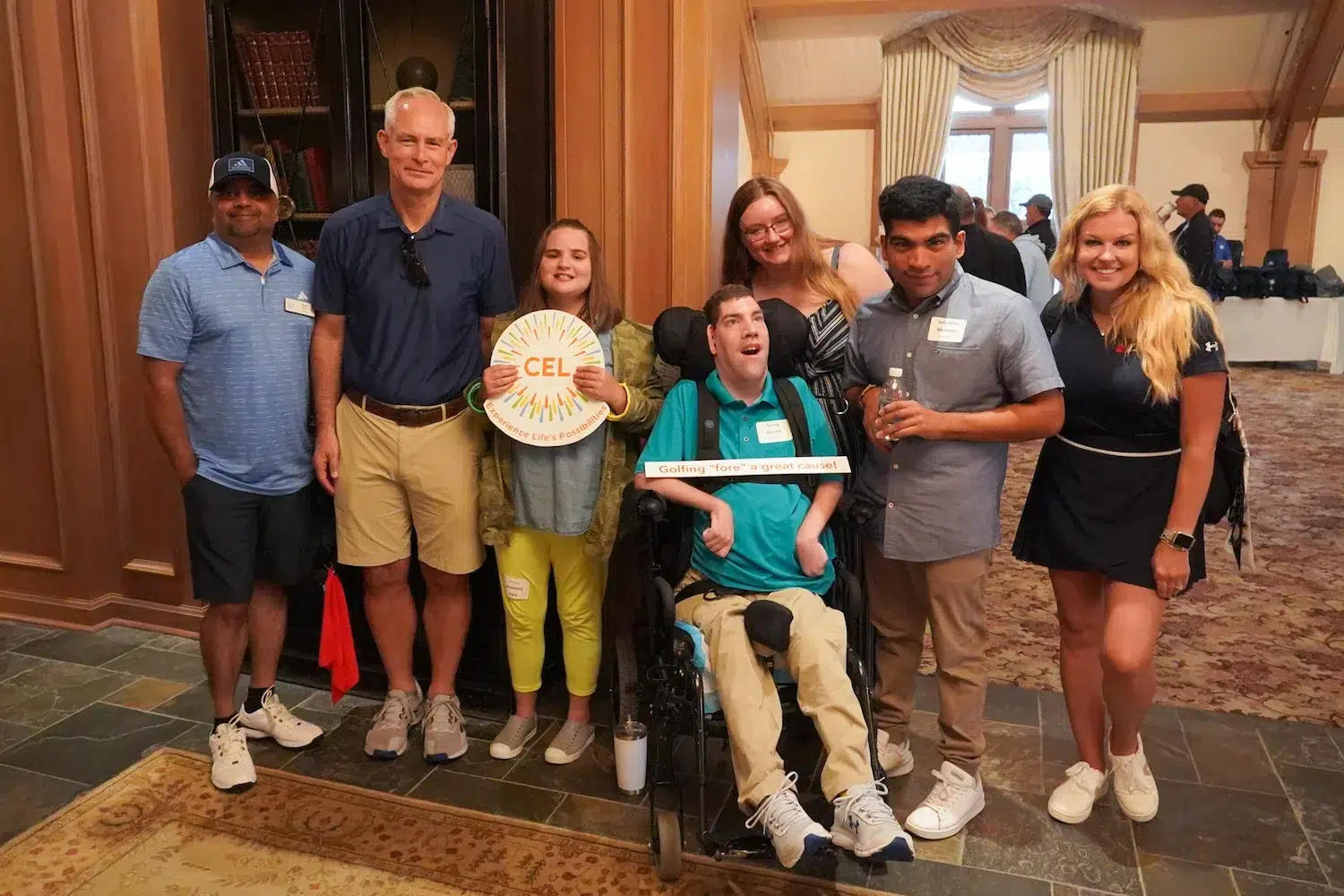 A group of CEL board members with members during golf tournament.
