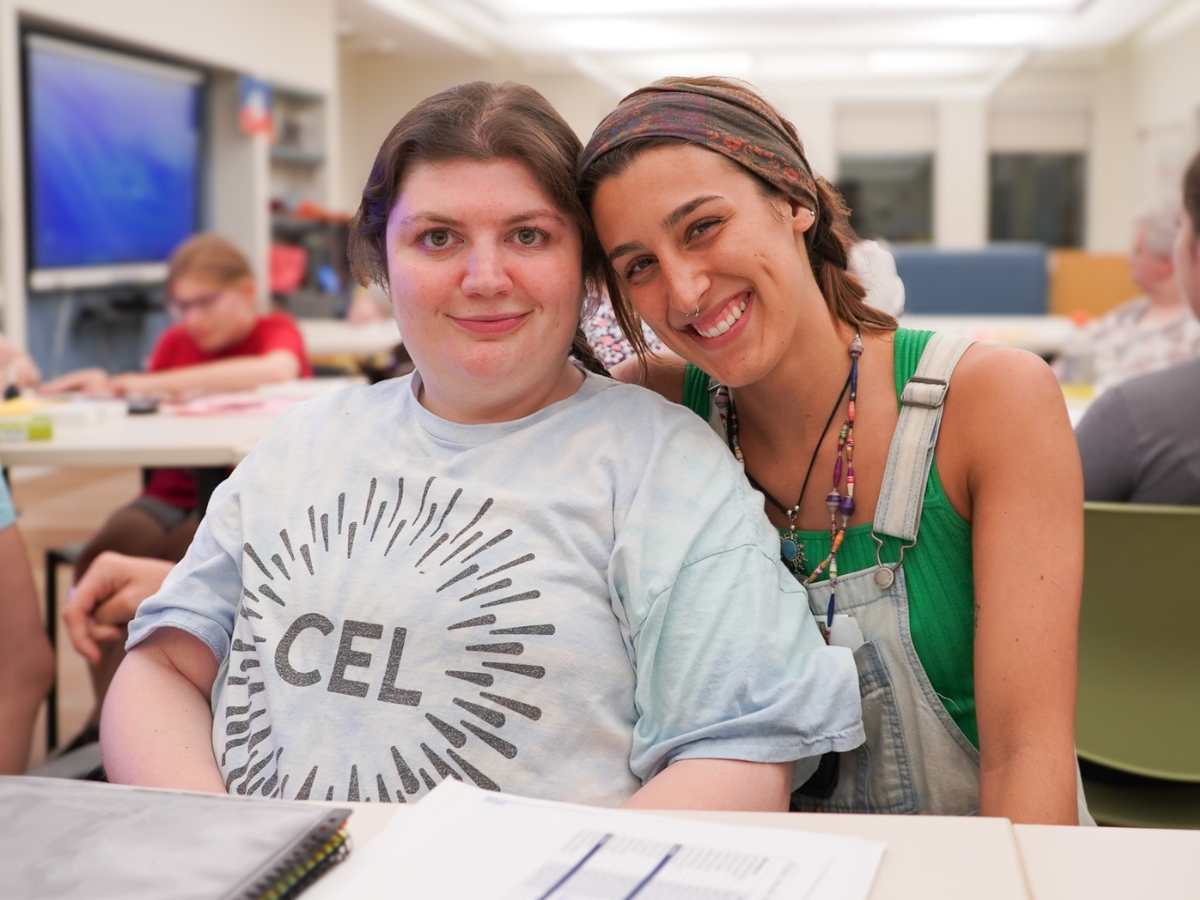 CEL member Jess with staff Martina at Ladies Night smiling