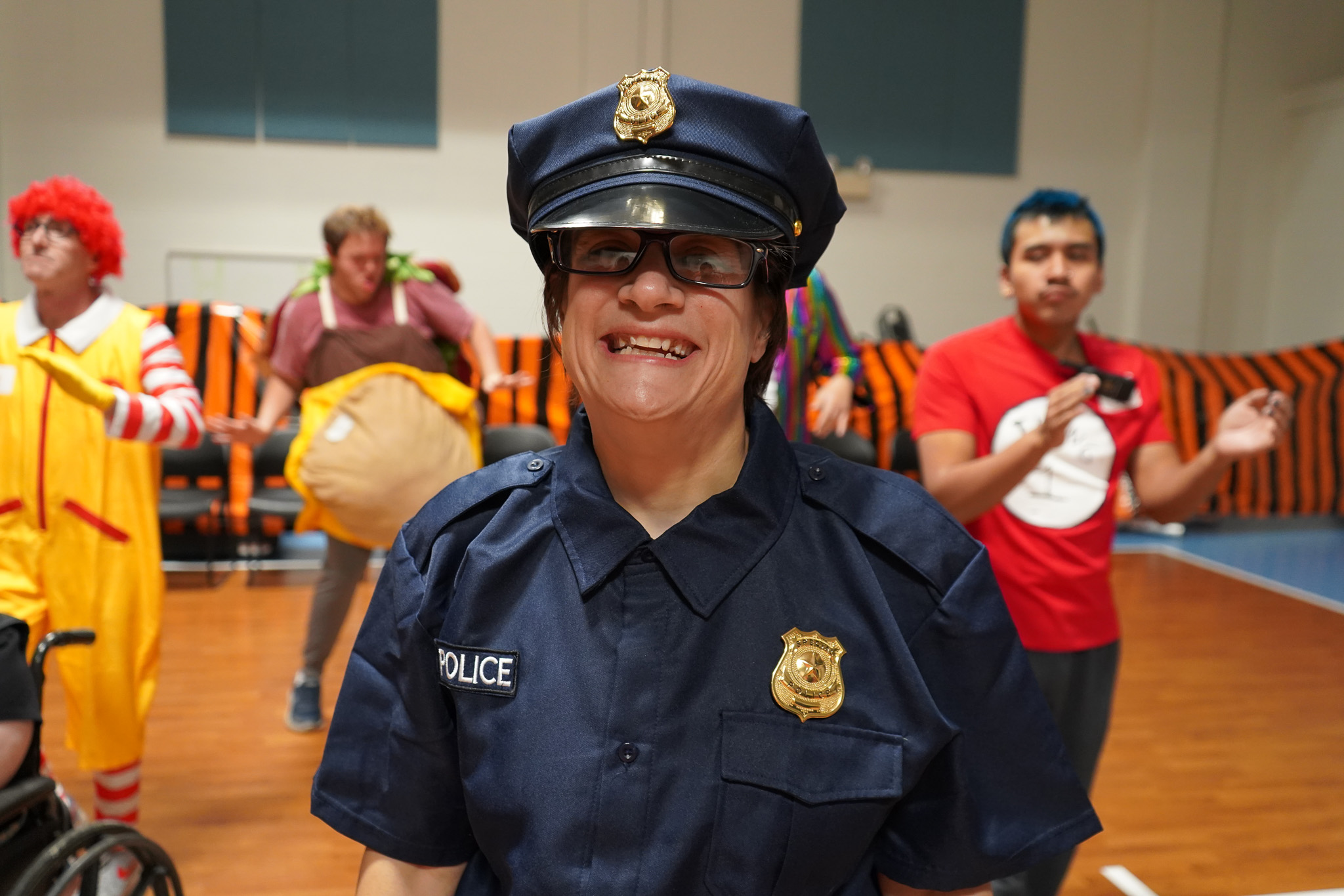 A member dresses up as a police officer at the Harvest Dance
