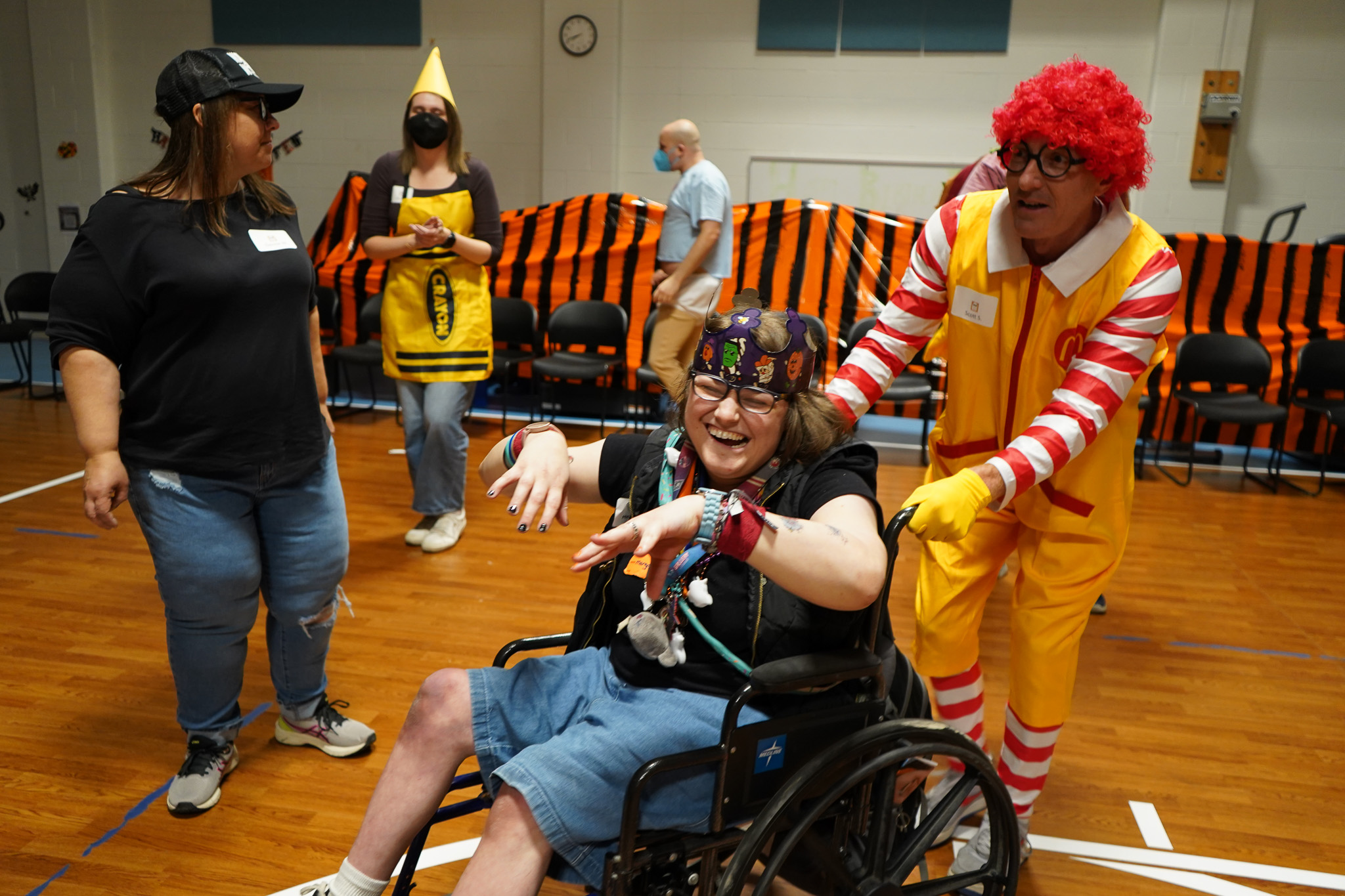 CEL members and staff dance in halloween costumes at the Harvest Dance