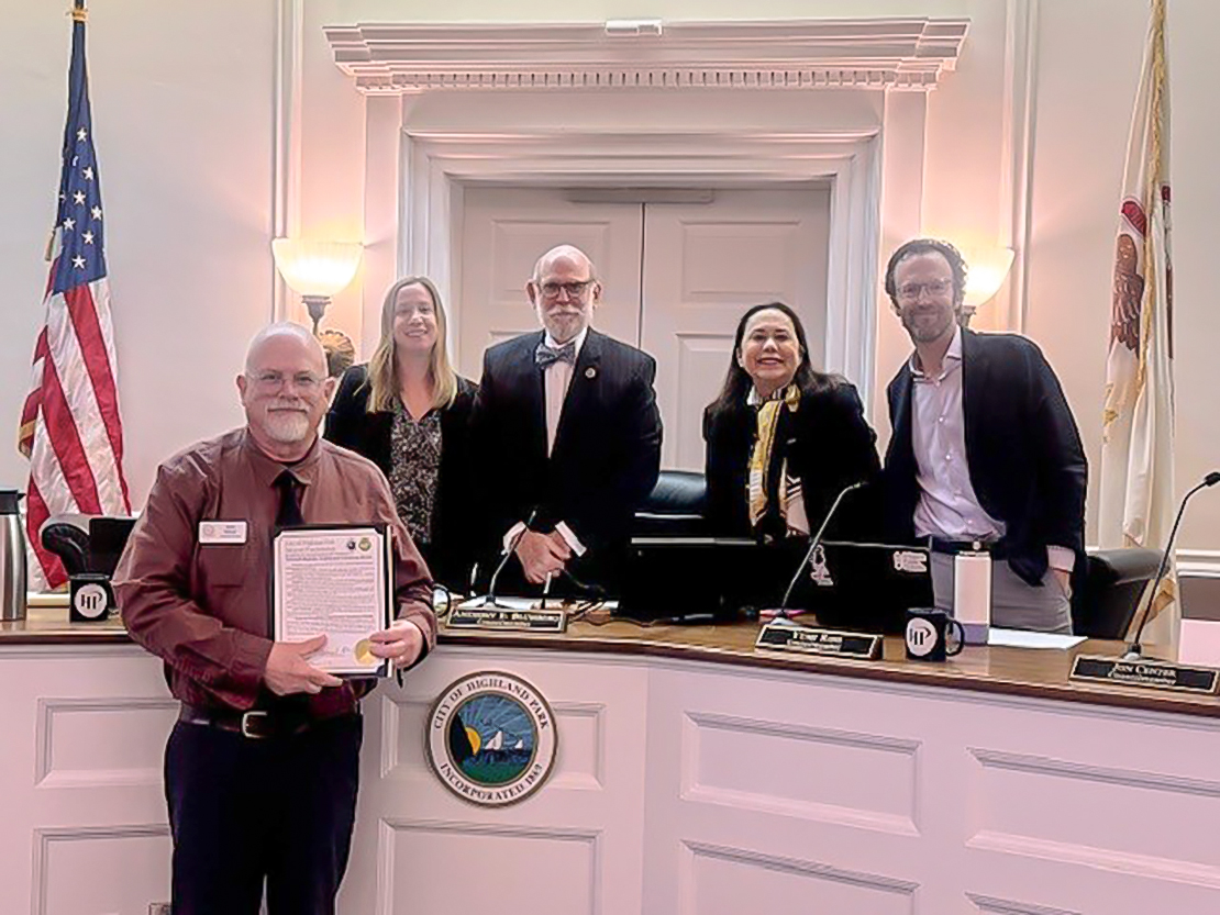 Don Miner, CEL Employment Specialist, receives a Mayoral Proclamation honoring the 80th Anniversary of NDEAM from four city council members