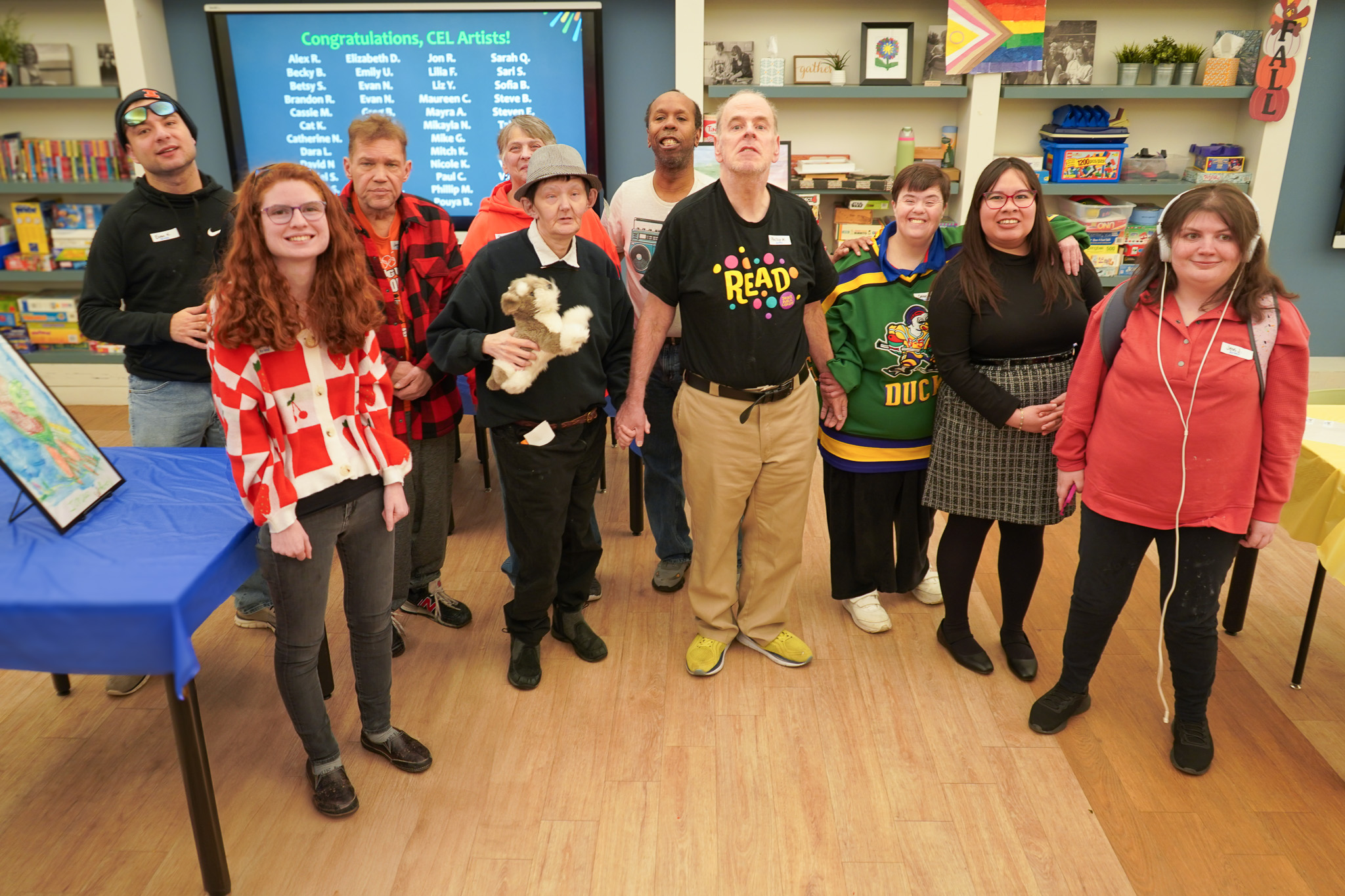 Ten CEL member artists pose for a photo at Artful Evening