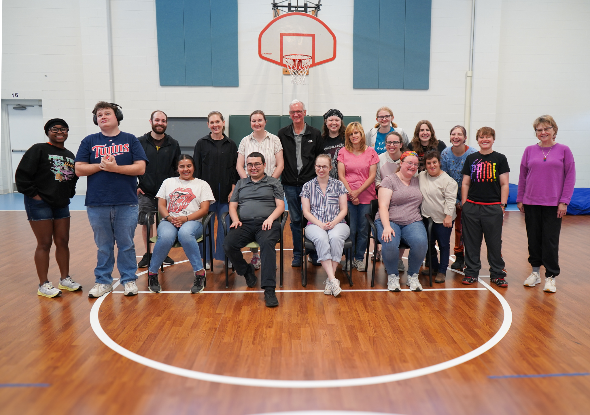 19 Members and staff pose for a photo in the gym