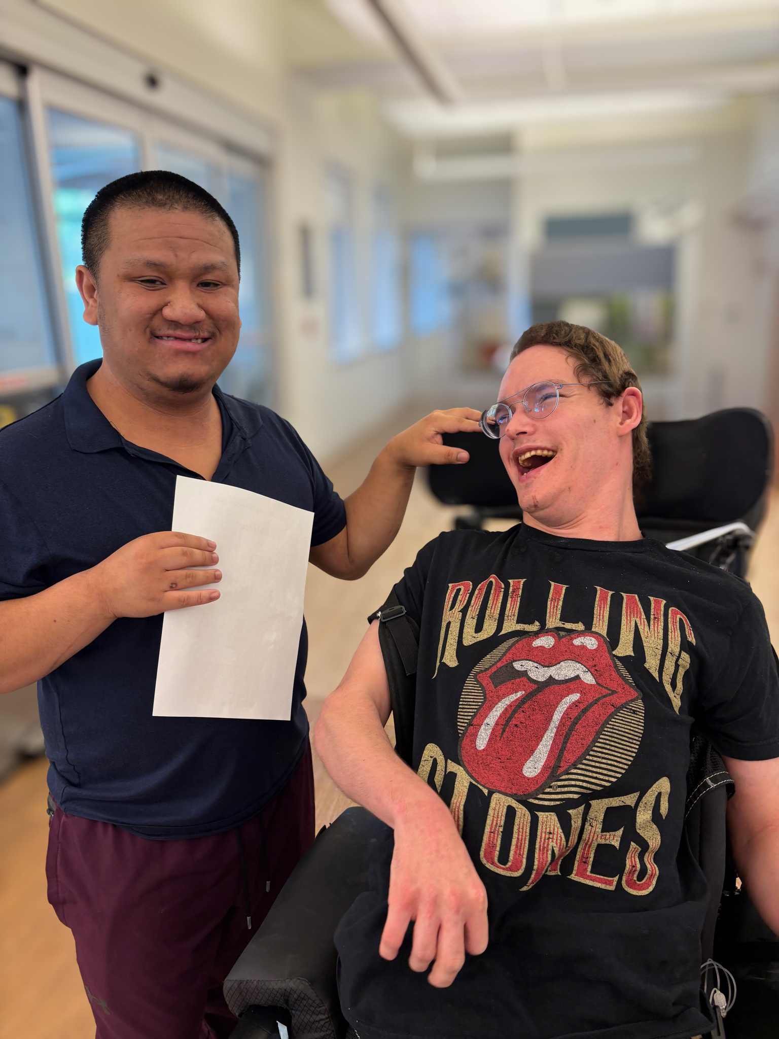 Two CEL members smiling