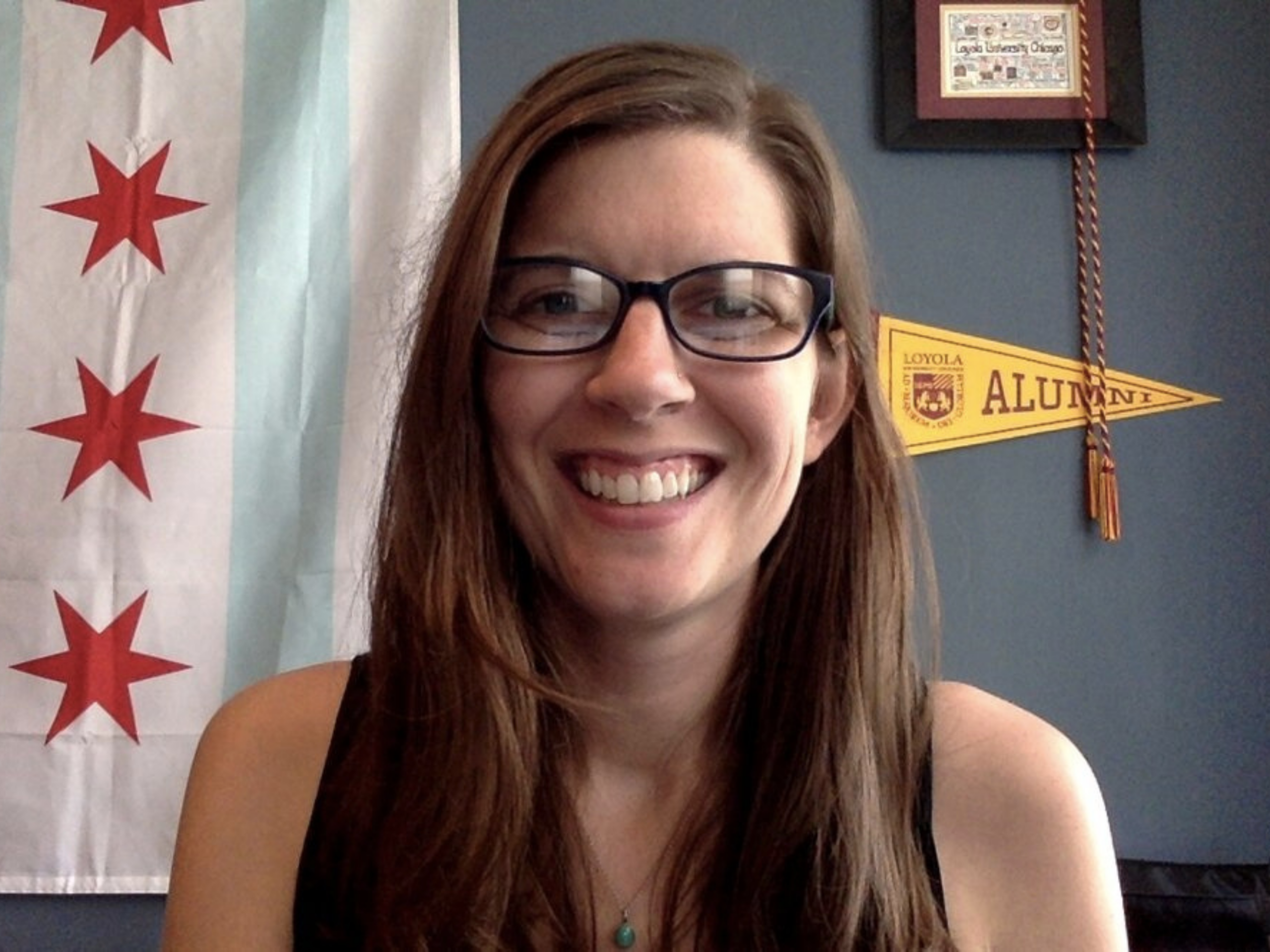 Kim Smith smiles in her office